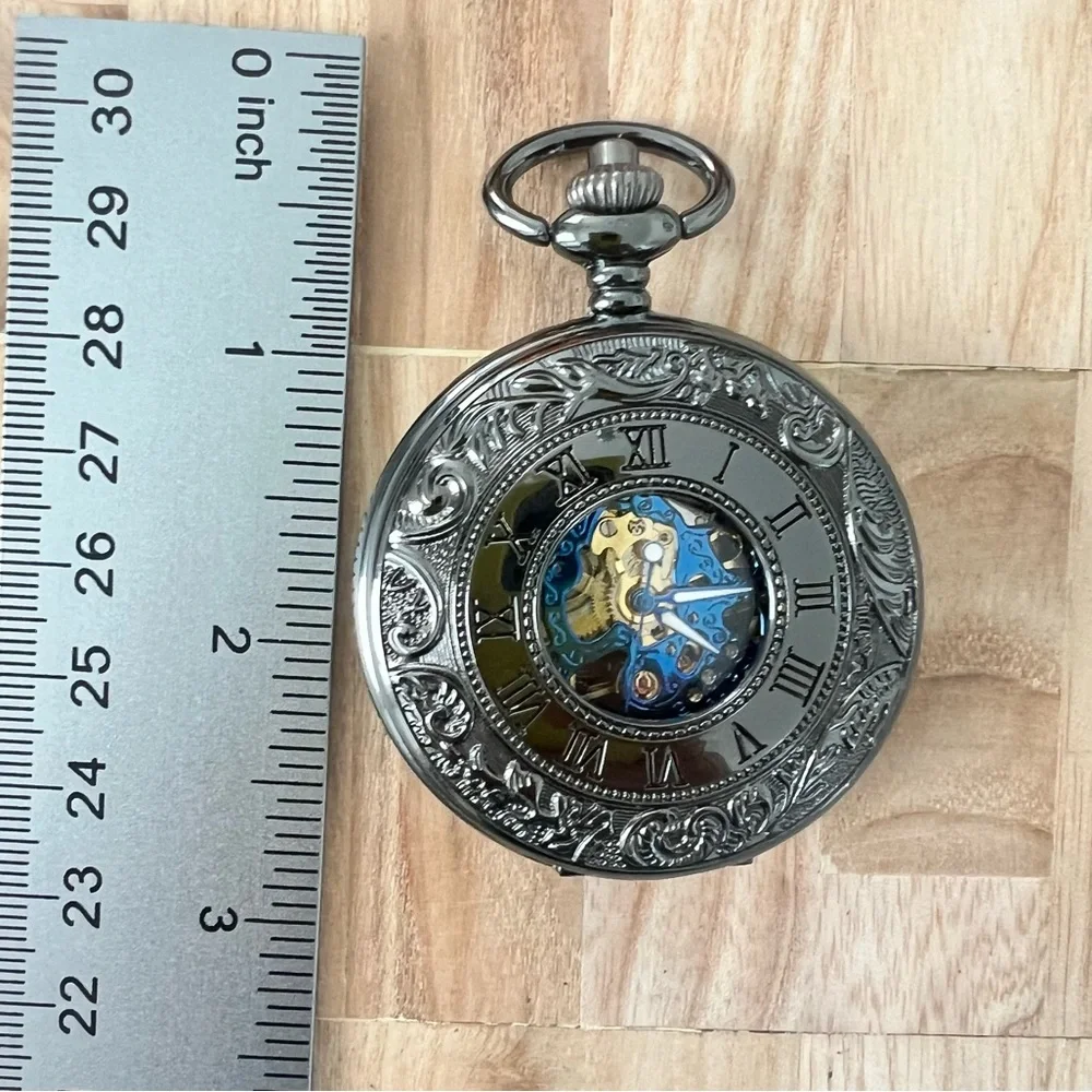 Black mechanical double sided Skelton peephole pocket watch working